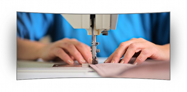 Lady operating a sewing machine